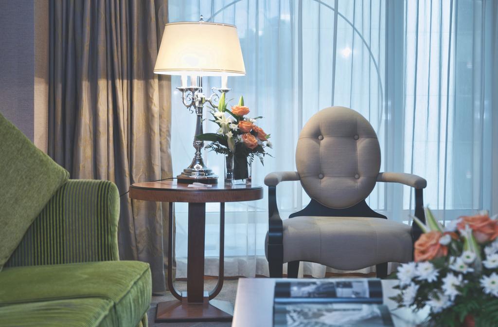 Wiseman Grand Hotel Doha Exterior foto A living room at the hotel